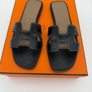 Hermès Oran Sandals Black Size EU 37.5 – Worn Twice w/ Box & Dust Bags